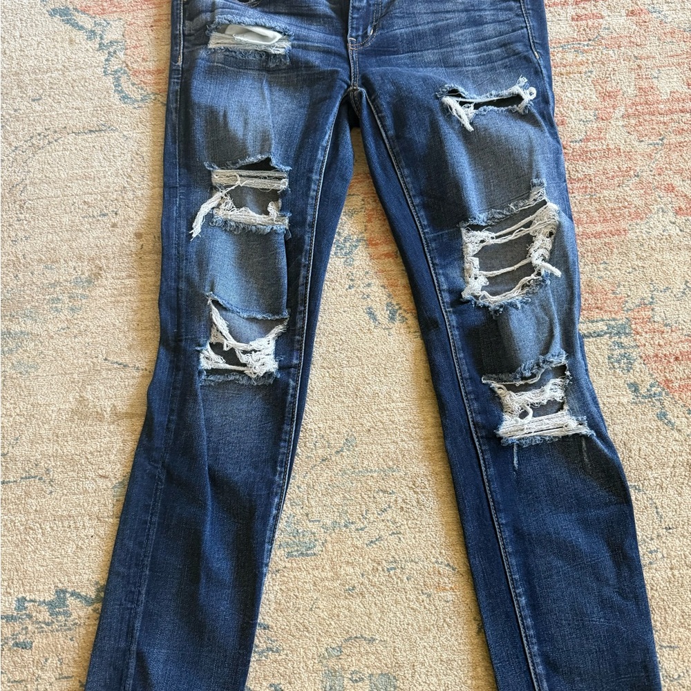 Distressed Blue Jeans